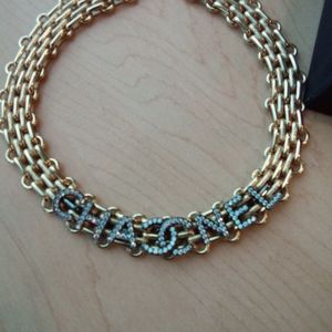 Authentic Chanel CC necklace in silver and gold